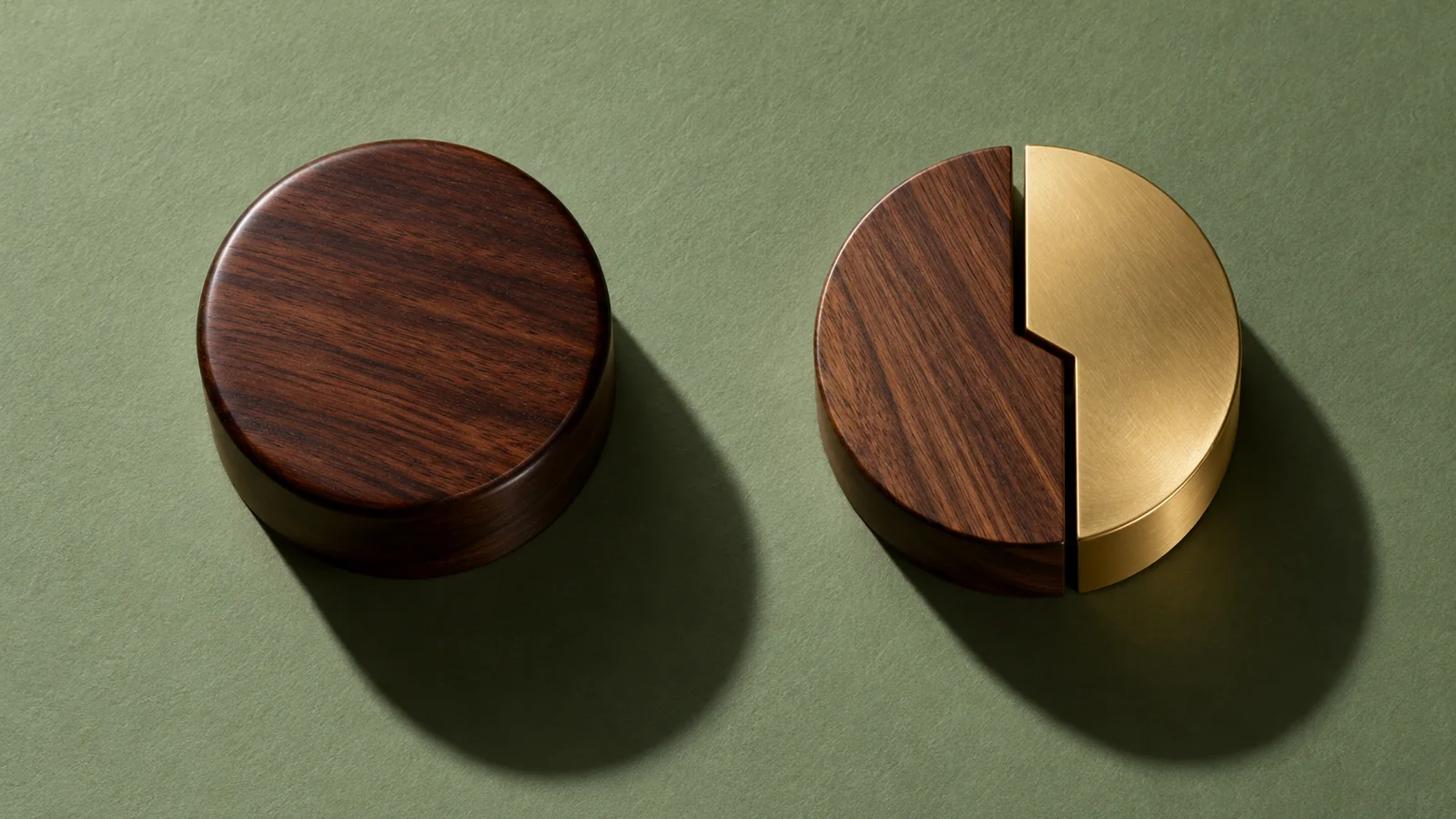 One dark wooden form beside a second form joined from walnut and brass