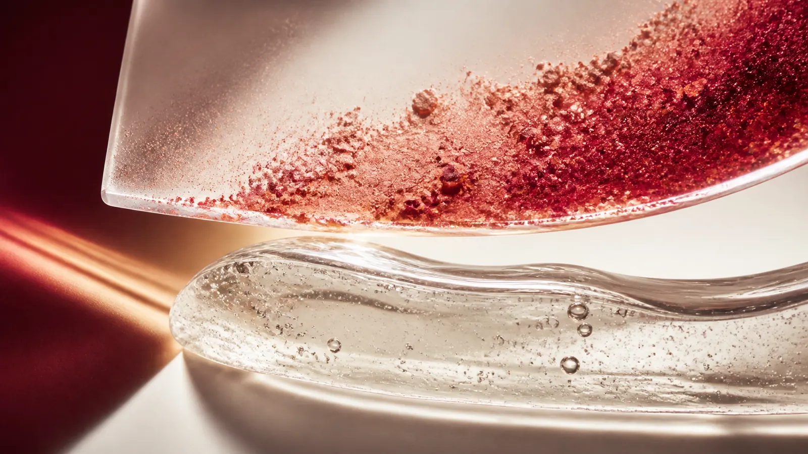 Abstract coral pigment particles resting above a separate translucent volume layer